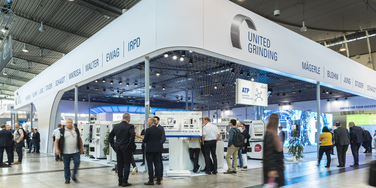 Großer Messestand der United Grinding Group: Mit zahlreichen Neuheiten und guten Zahlen zum Geschäftsverlauf präsentierte sich die Gruppe im Jahr 2024 zum Beispiel auf der GrindingHub in Stuttgart. Foto: United Grinding